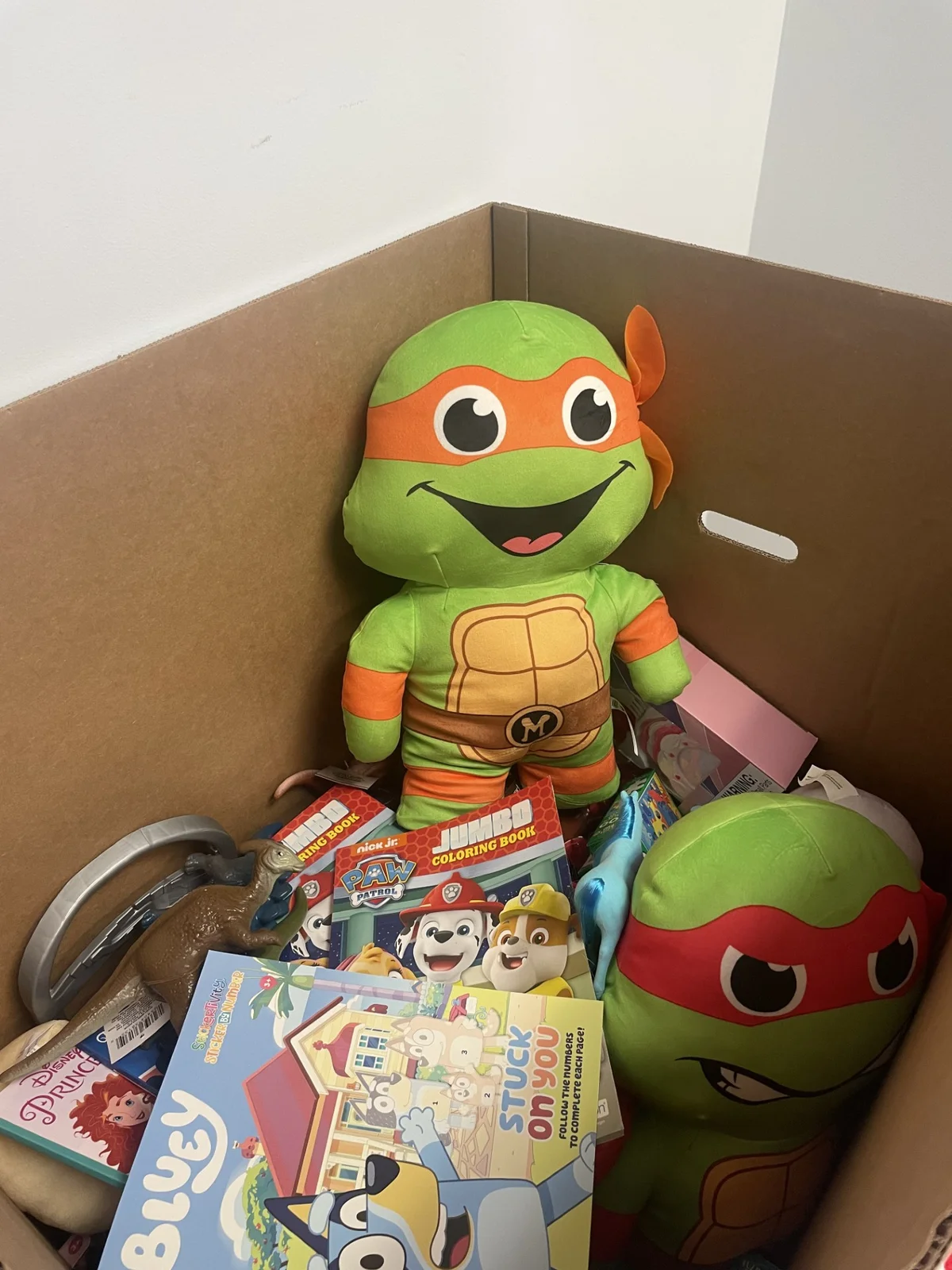 Box of new, unwrapped toys donated at the Air Experts office